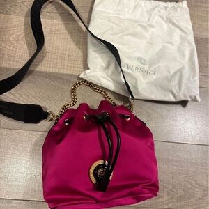 Versace bucket bag, hot pink. Authenticity cards included. Brand new never used!